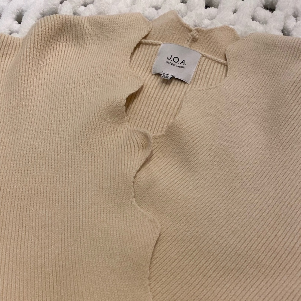 JOA scalloped edged cross cross cream sweater